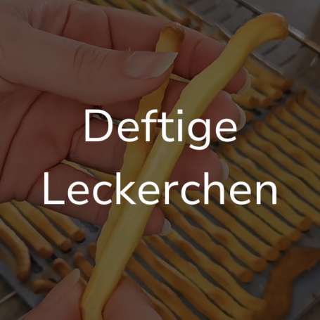 Link zur Seite "Deftige Leckerchen". Auf dem Bild: Eine gelbe Hundepommes.